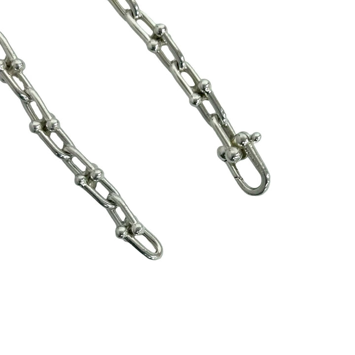 blurRubbingTiffany Hardware Small Link BureRubbingCut