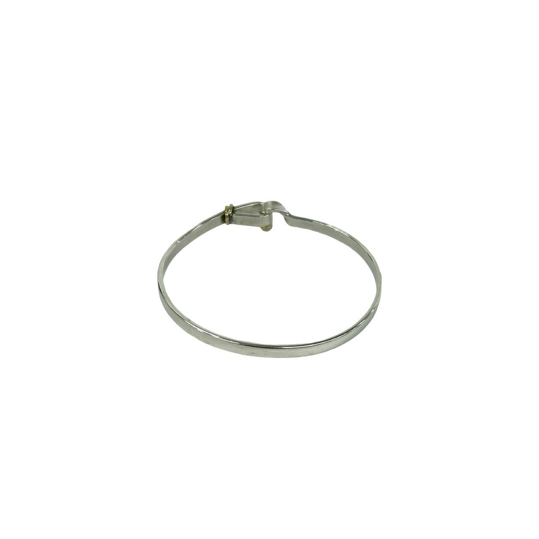blurRubbingTiffany hook and eye bangle