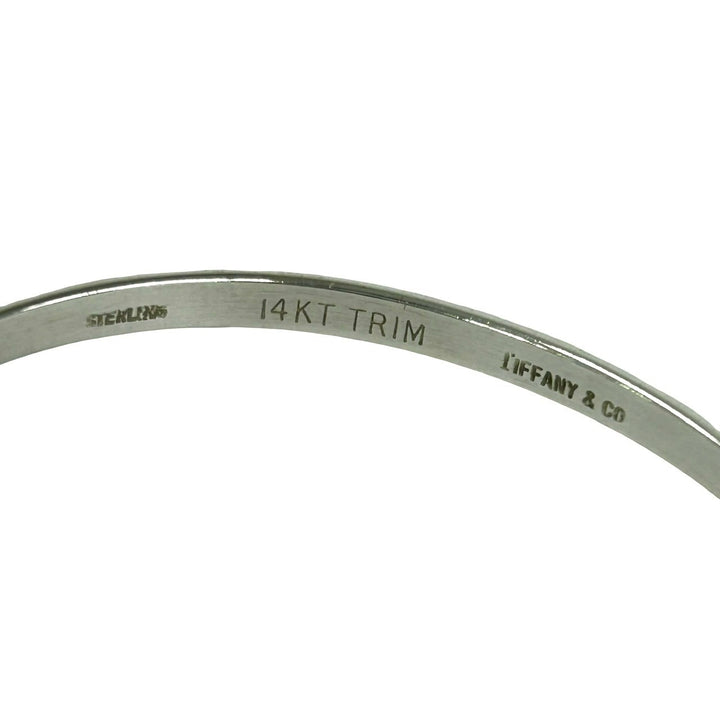 blurRubbingTiffany hook and eye bangle