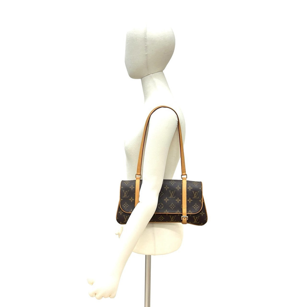 Handbag Louis Vuitton Pochette Marel