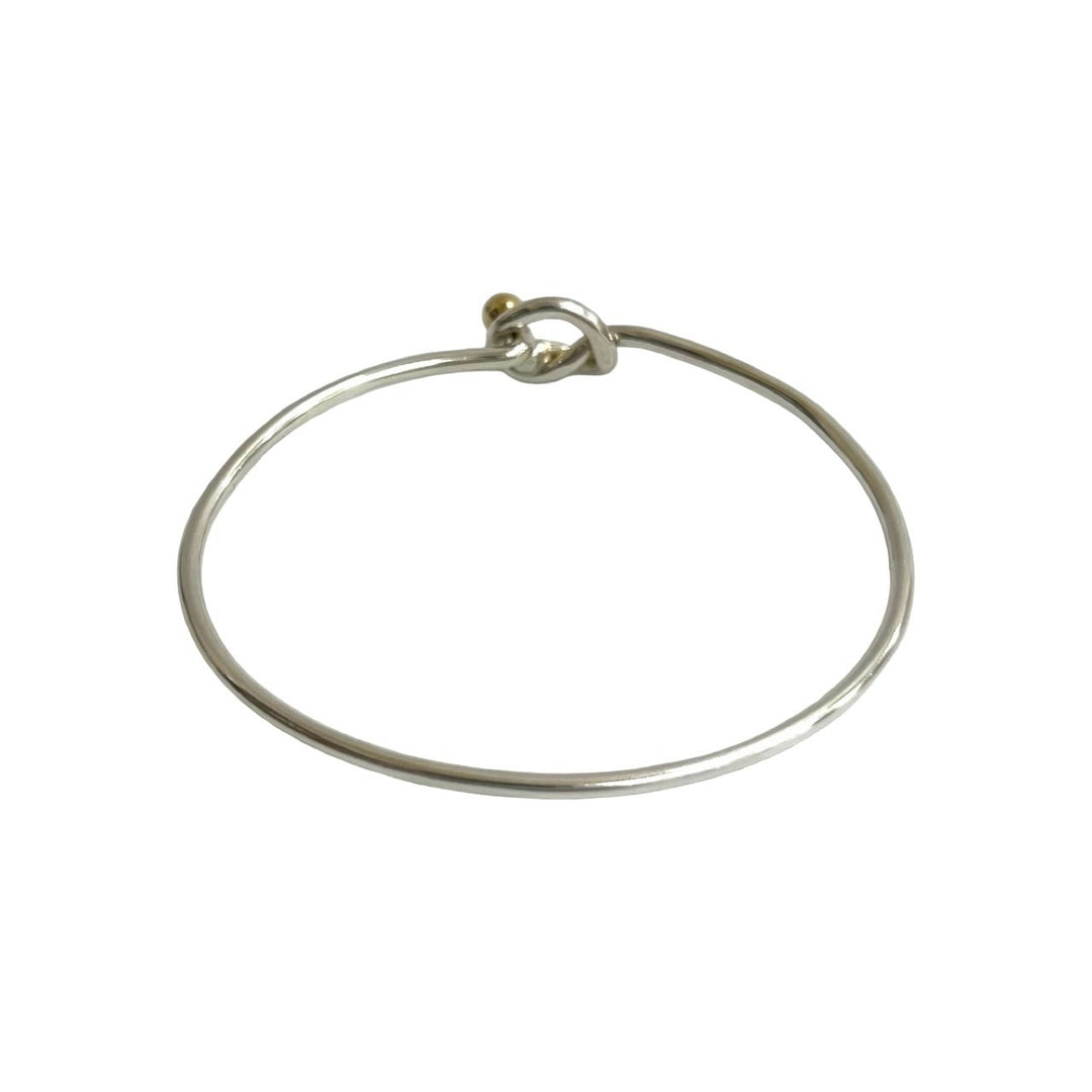 blurRubbingTiffany hook and eye bangle