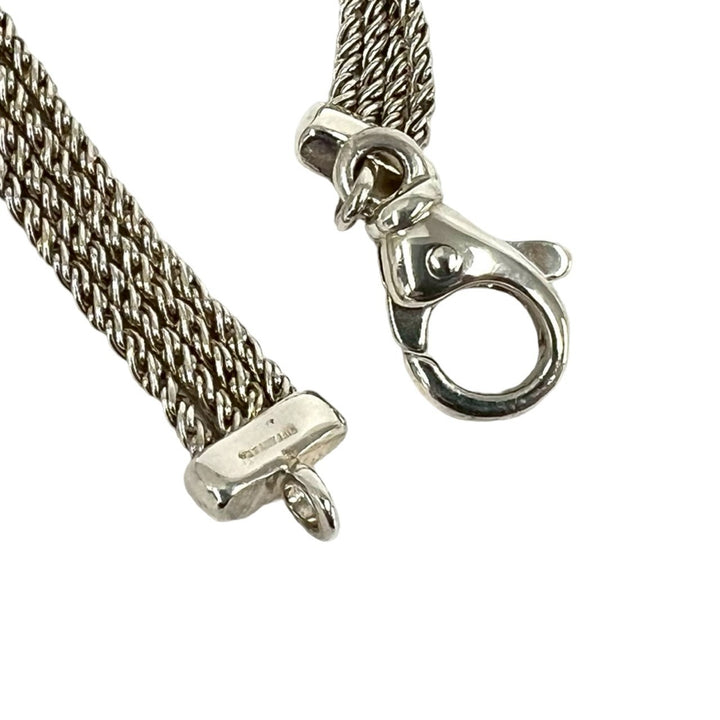 blurRubbingTiffany Twisted Rope BureRubbingCut