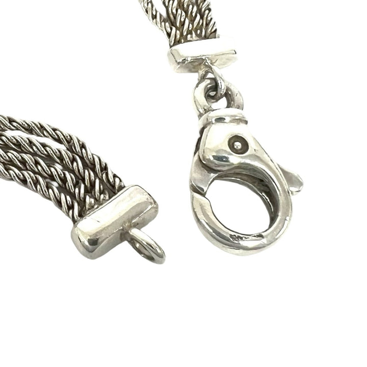 blurRubbingTiffany triple rope blurRubbingCut