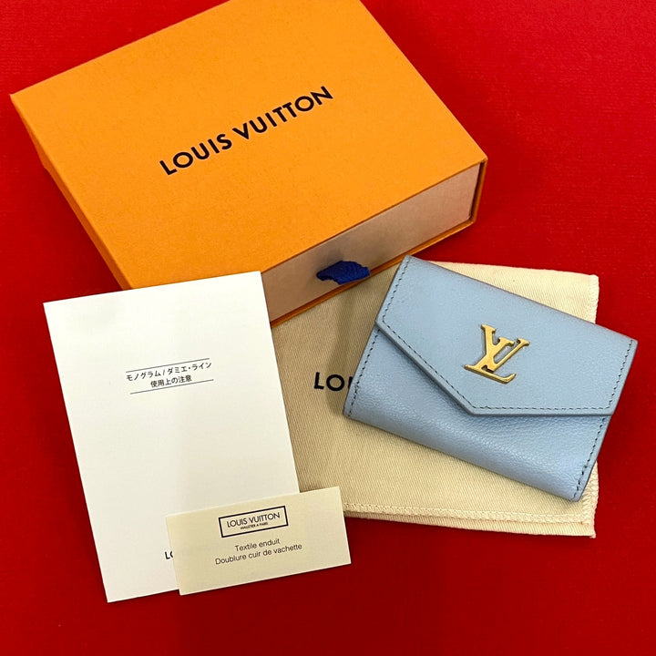Tri-fold wallet Louis Vuitton Portefeuille Rock Mini