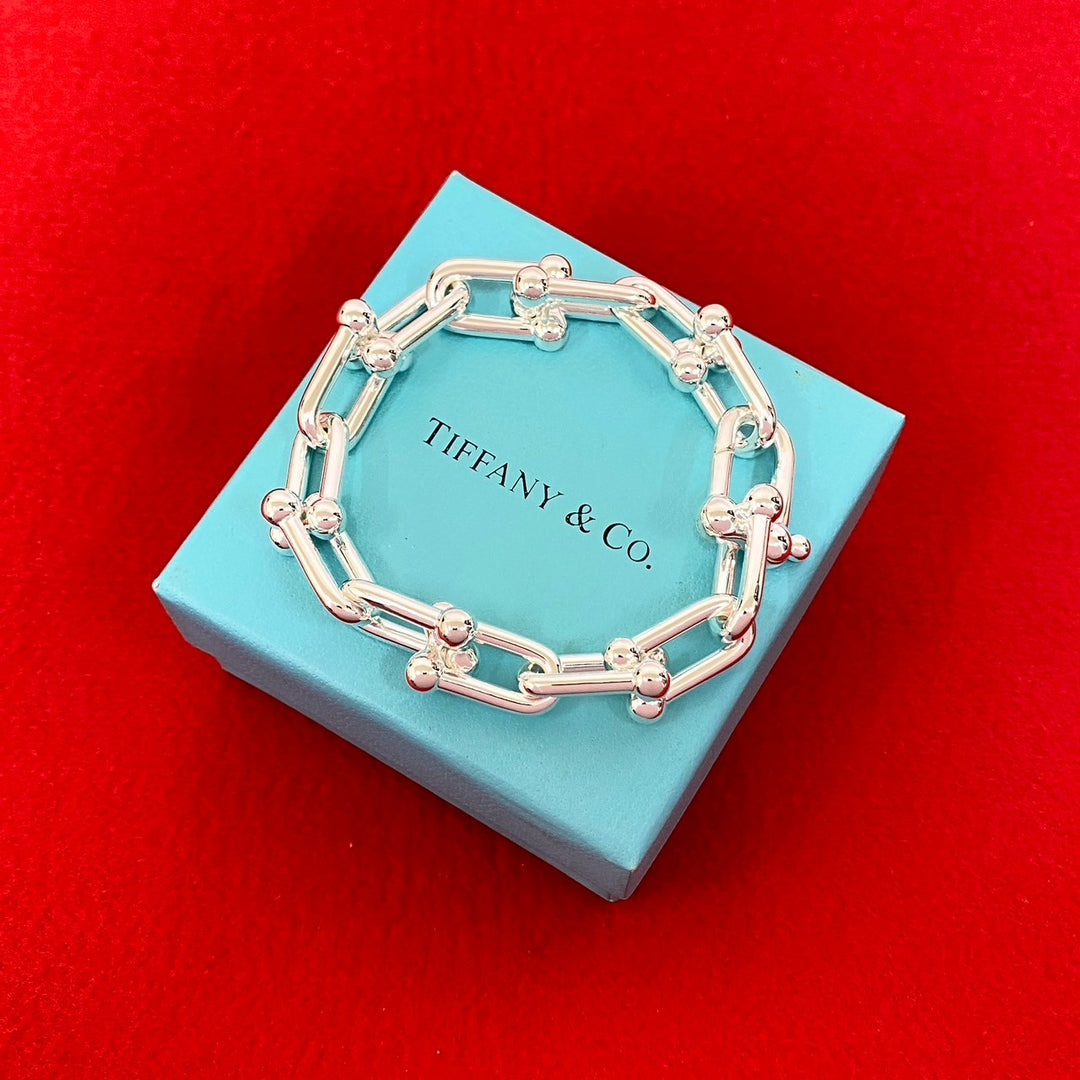 blurRubbingTiffany Hardware Large Link BureRubbingCut