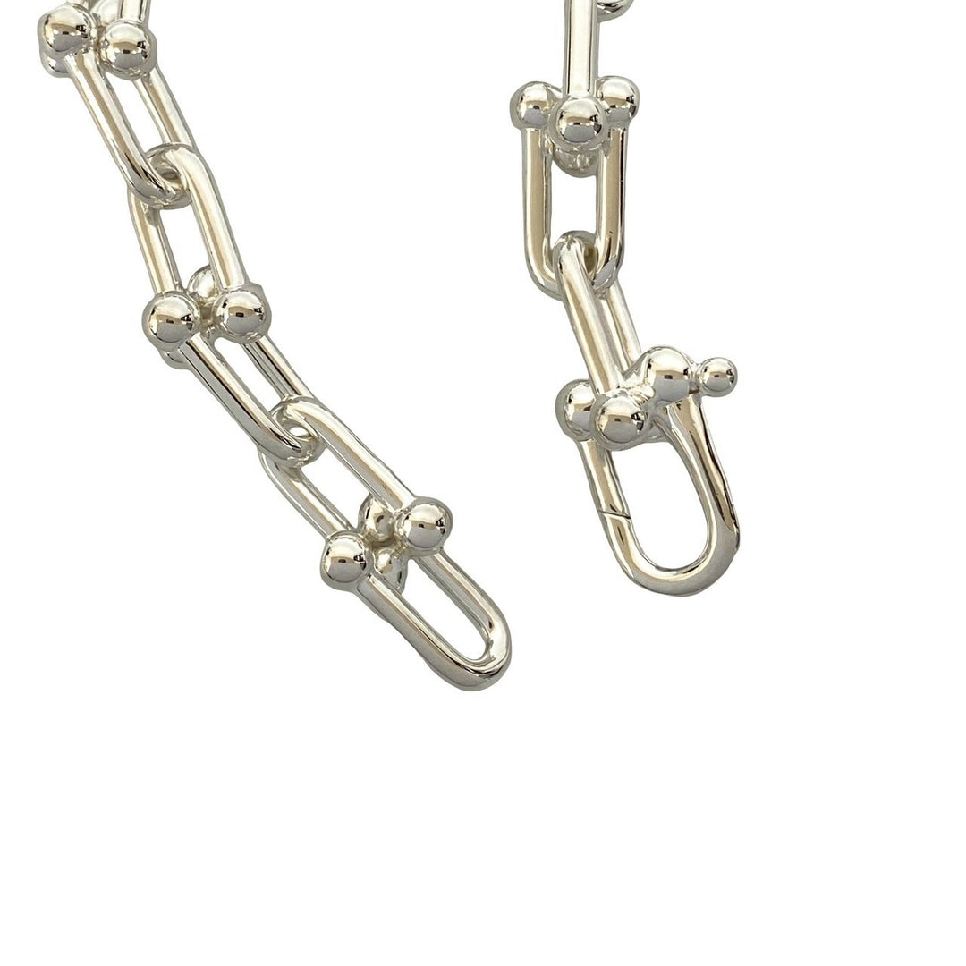 blurRubbingTiffany Hardware Large Link BureRubbingCut