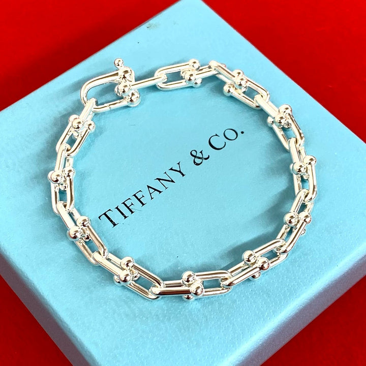 blurRubbingTiffany Hardware Small Link BureRubbingCut