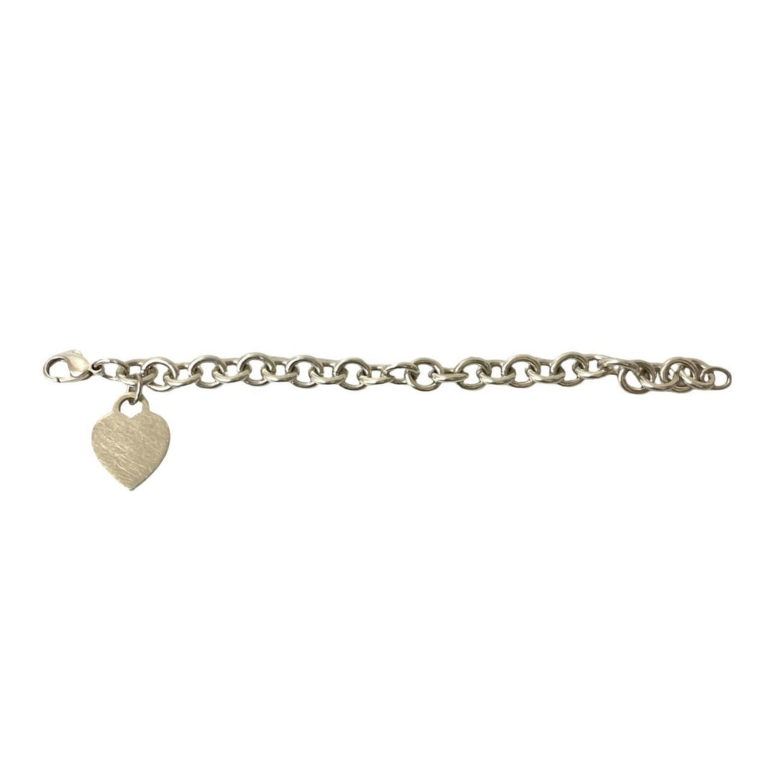 blurRubbingTiffany heart tag