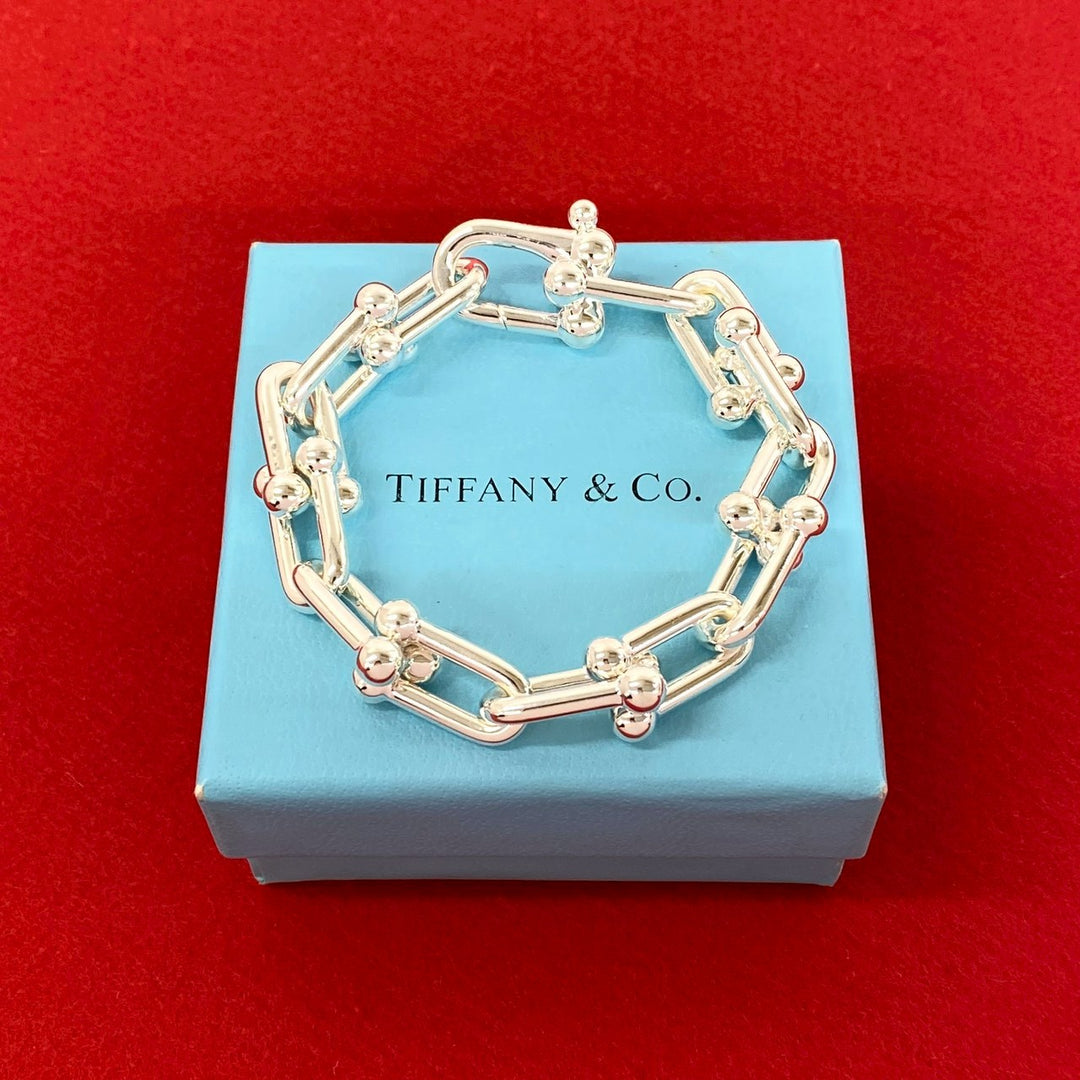 blurRubbingTiffany Hardware Large Link BureRubbingCut