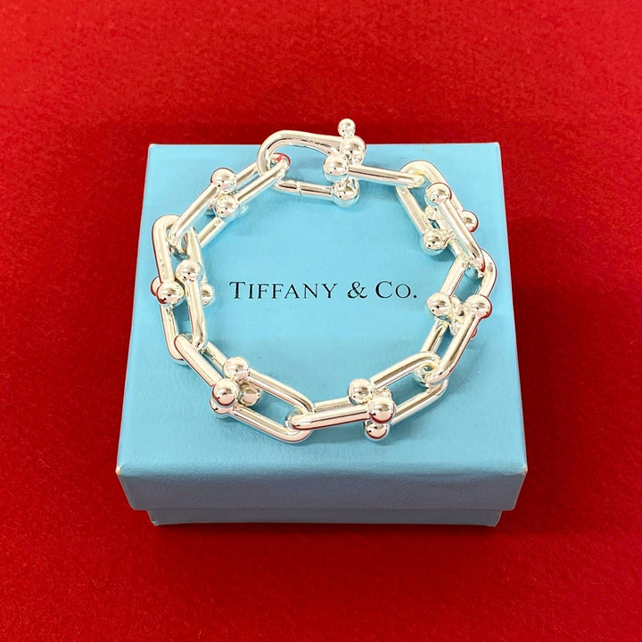 blurRubbingTiffany Hardware Large Link BureRubbingCut