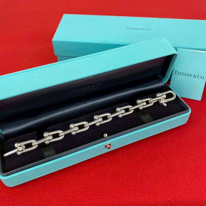 blurRubbingTiffany Hardware Large Link BureRubbingCut