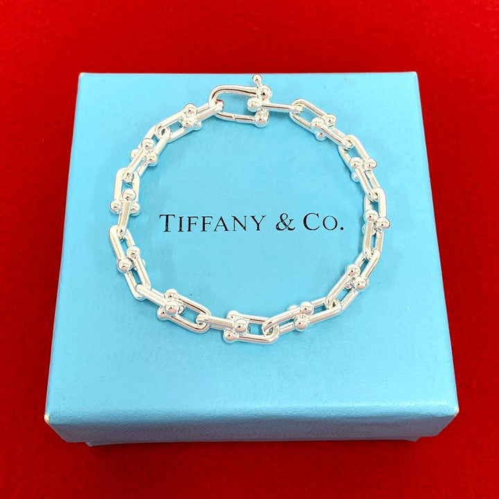 blurRubbingTiffany Hardware Small Link BraceletRubbingCut
