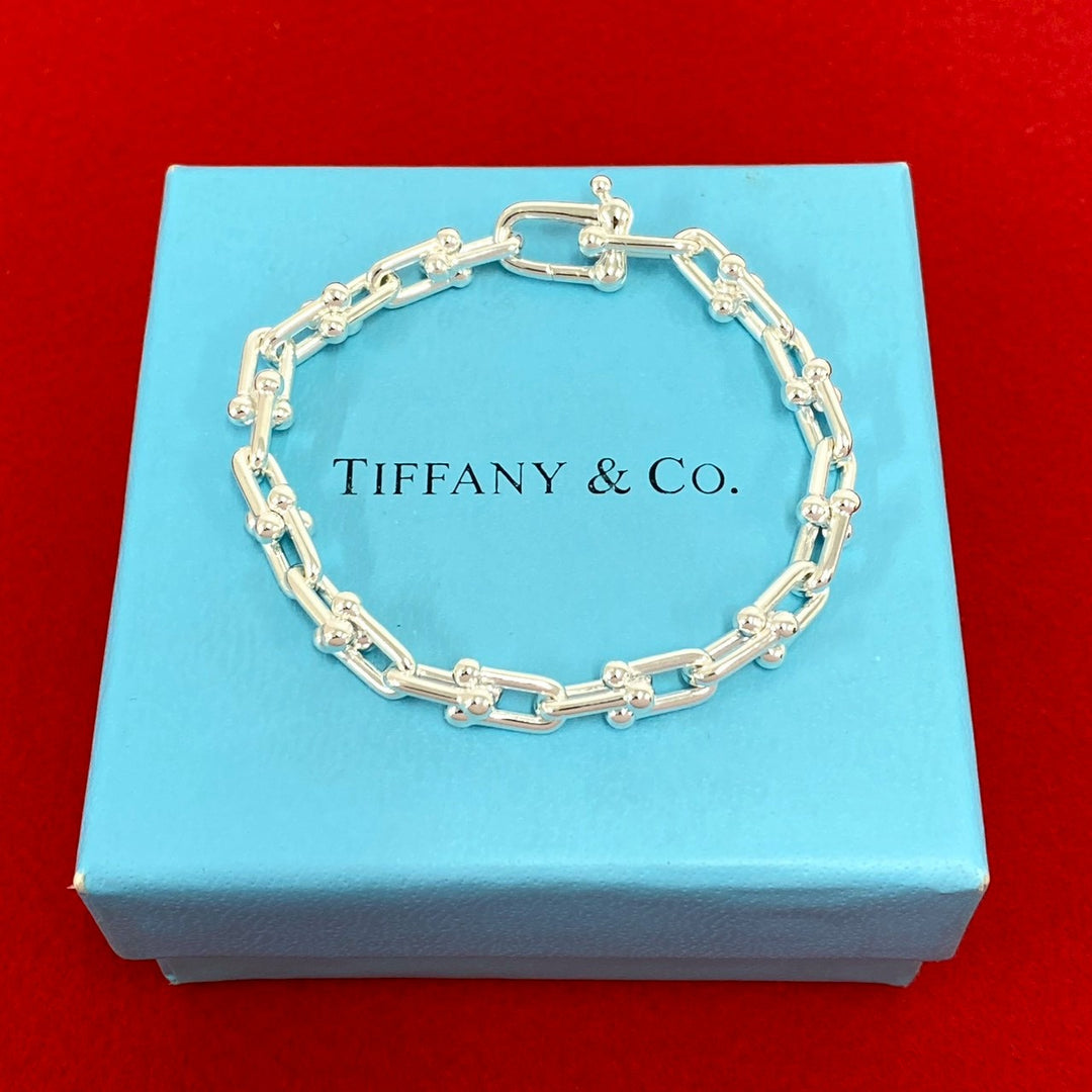blurRubbingTiffany Hardware Small Link BraceletRubbingCut