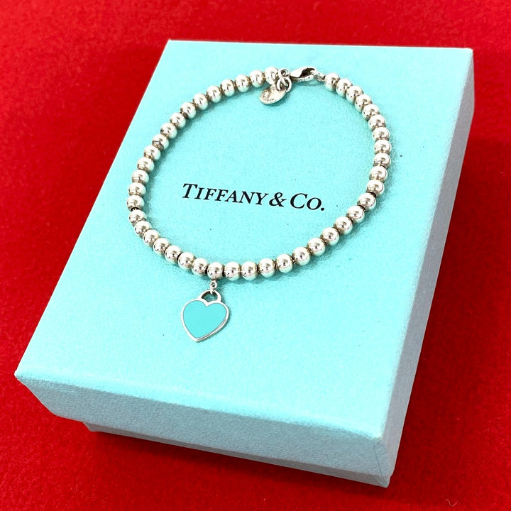 blurRubbingTiffany Return Toe Tiffany Beads BureRubbingCut