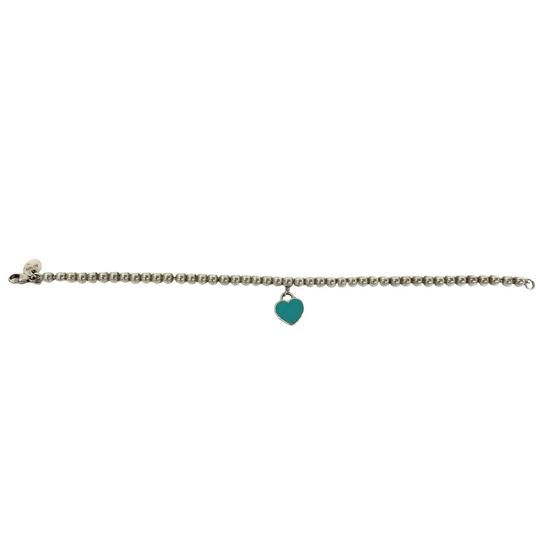 blurRubbingTiffany Return Toe Tiffany Beads BureRubbingCut