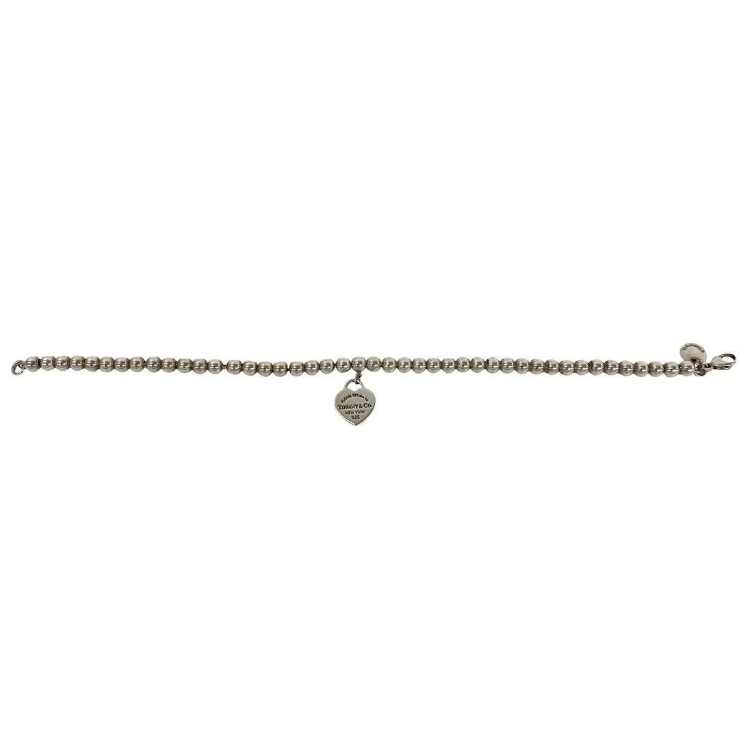 blurRubbingTiffany Return Toe Tiffany Beads BureRubbingCut