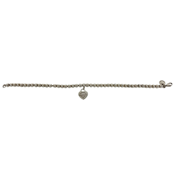 blurRubbingTiffany Return Toe Tiffany Beads BureRubbingCut