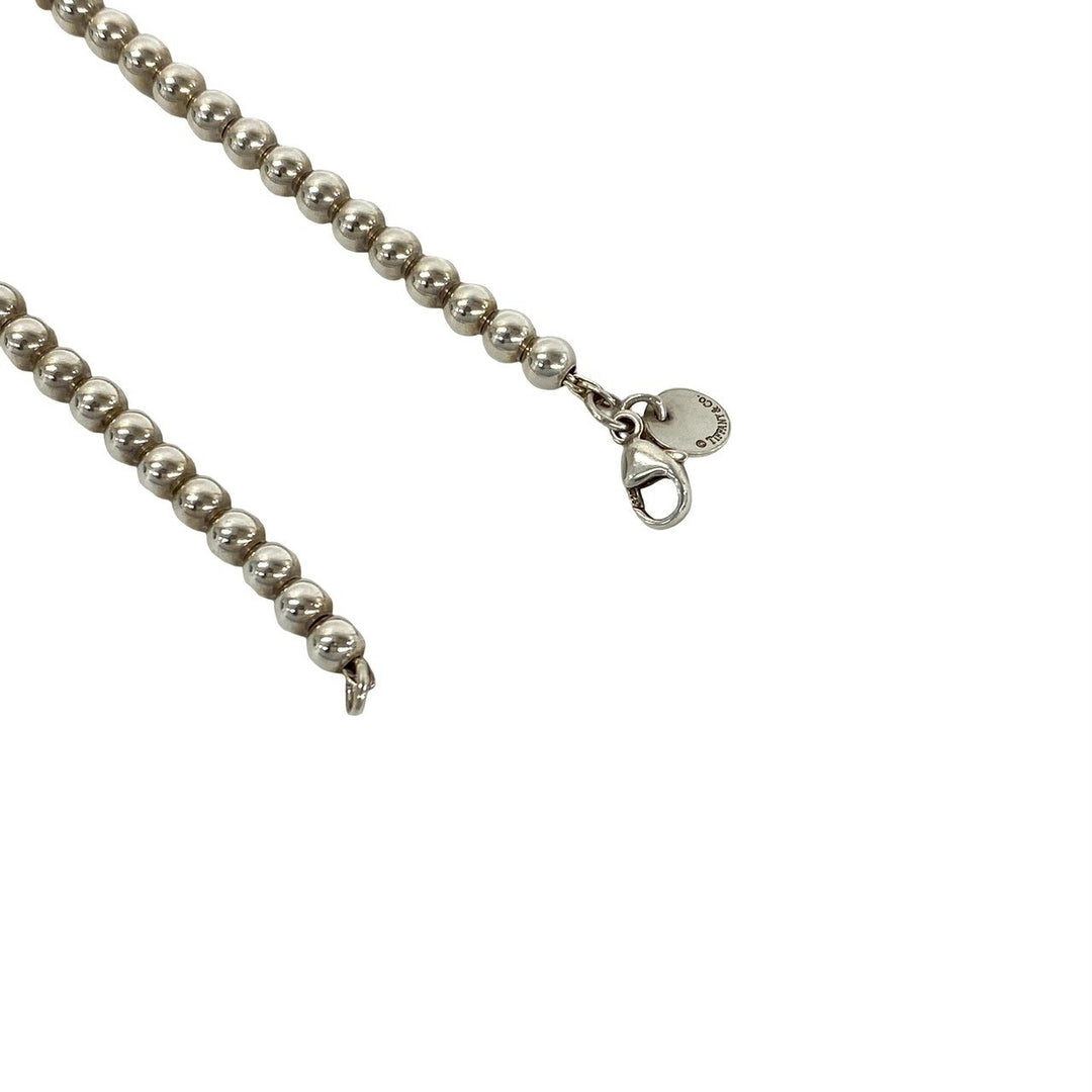 blurRubbingTiffany Return Toe Tiffany Beads BureRubbingCut