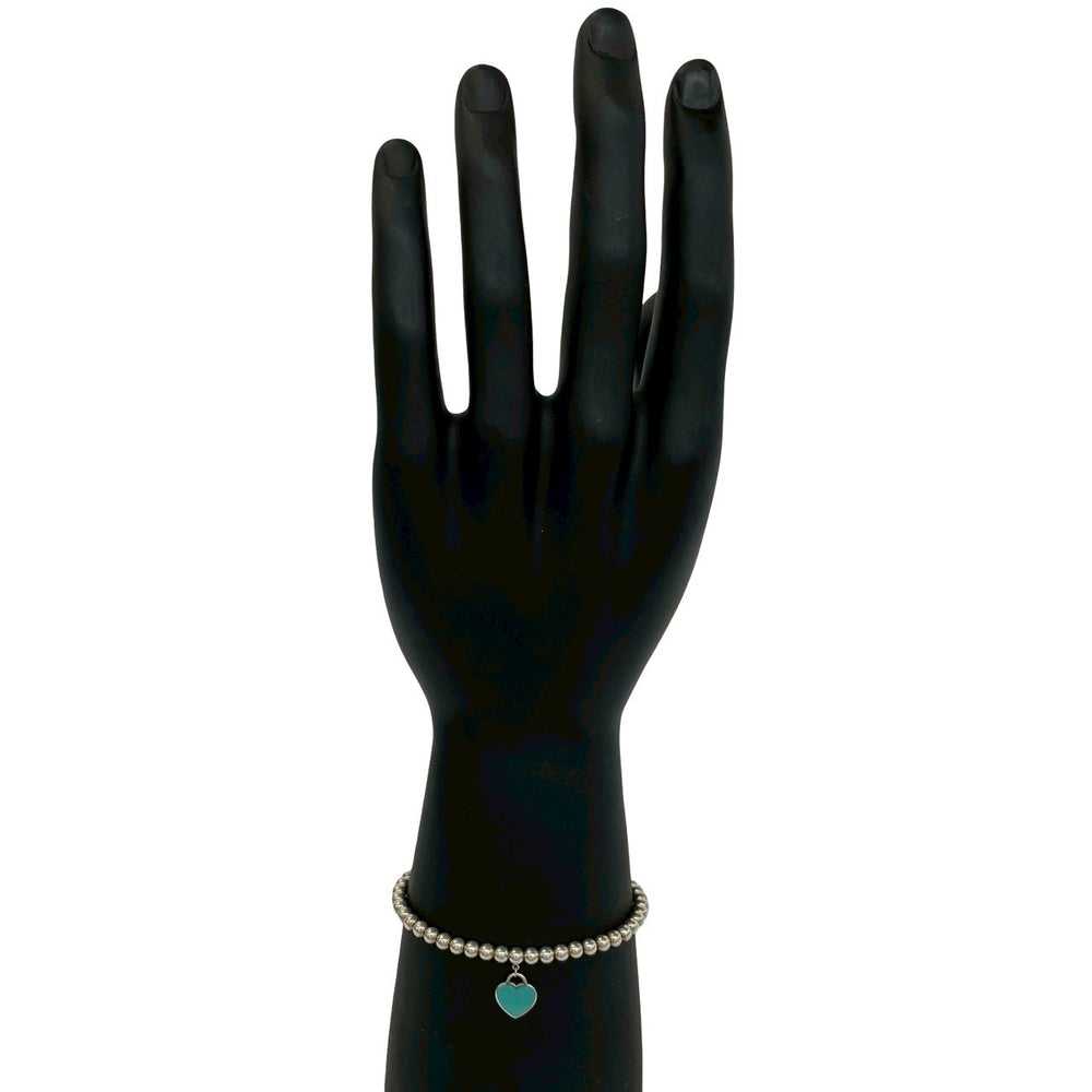 blurRubbingTiffany Return Toe Tiffany Beads BureRubbingCut